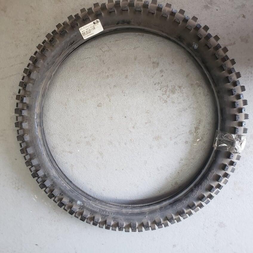 [18-333-652] TIRE 70/100-19 BRID.